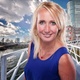 portretfoto van Maria Hallensleben met Rotterdam op de achtergrond