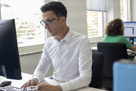 Image of Action employee working
